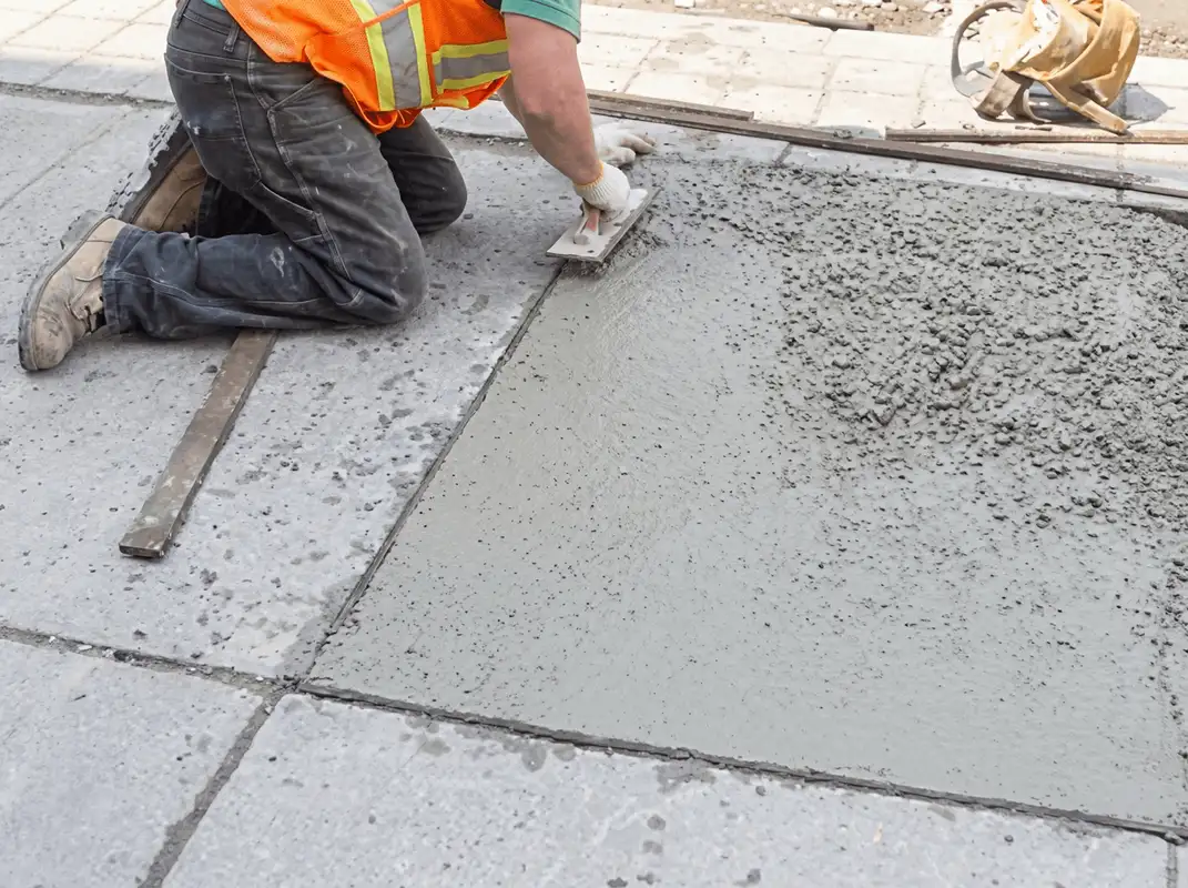 Professional repairing a concrete floor in Charleston, SC