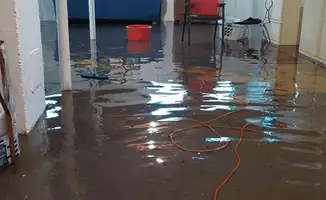 Basement with boiler, cabinets and washing machine completely flooded in Charleston, SC